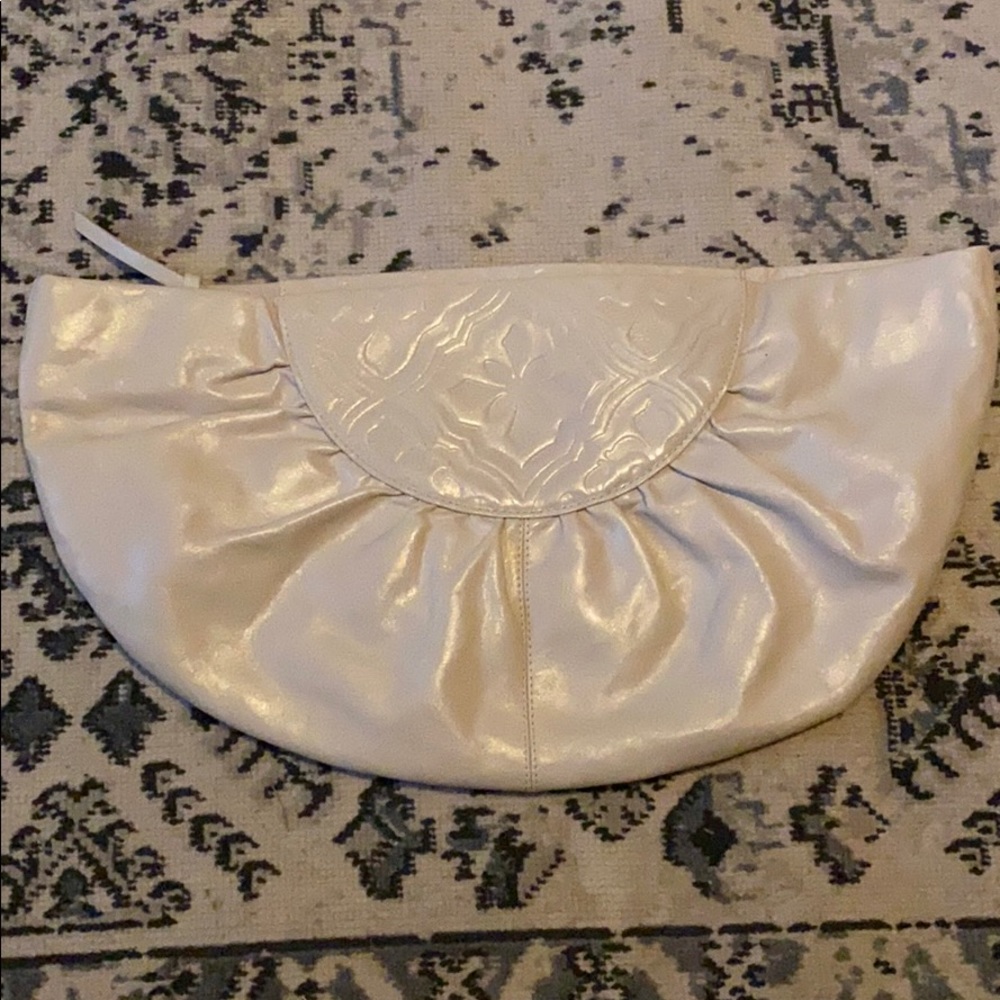 Oversized Hobo International white clutch